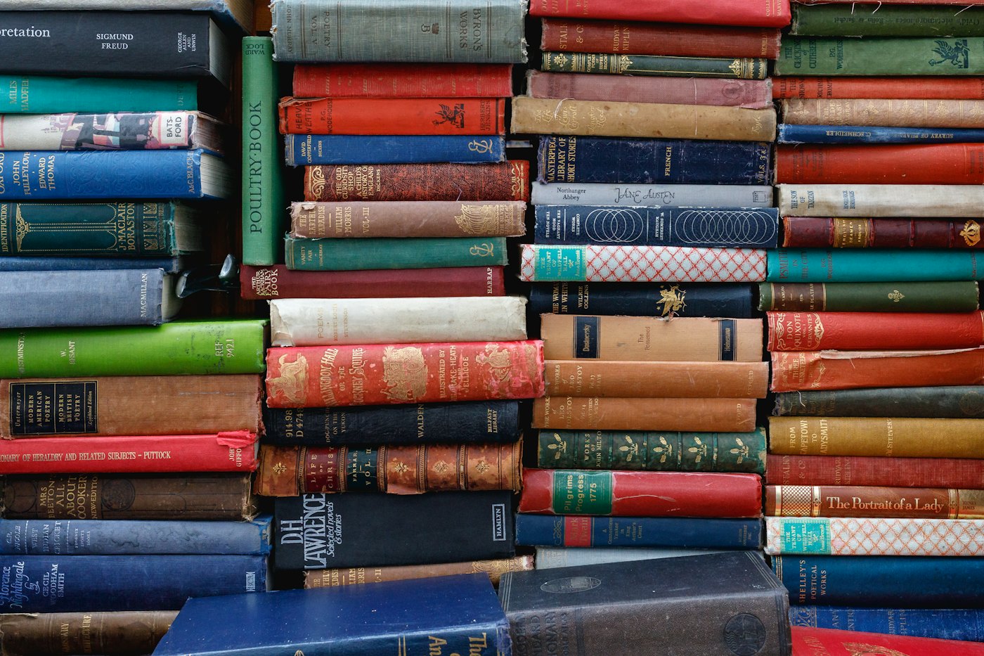 Large stack of colorful books